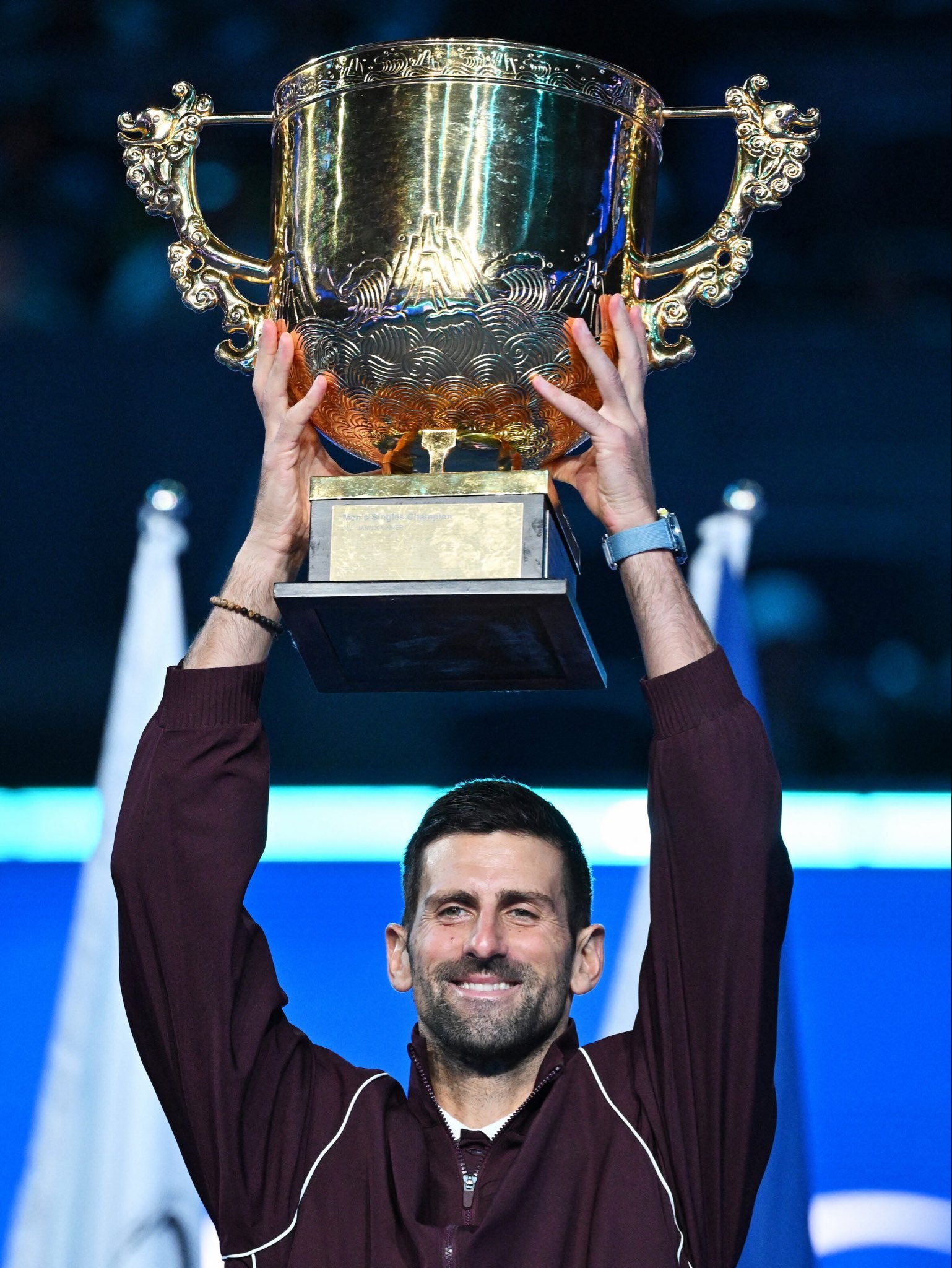 Djokovic wins seventh China Open title as De Minaur retires injured in Beijing final