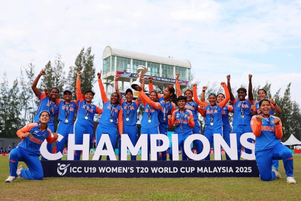 India U19 women's cricket team celebrating with the U19 Women's T20 World Cup trophy