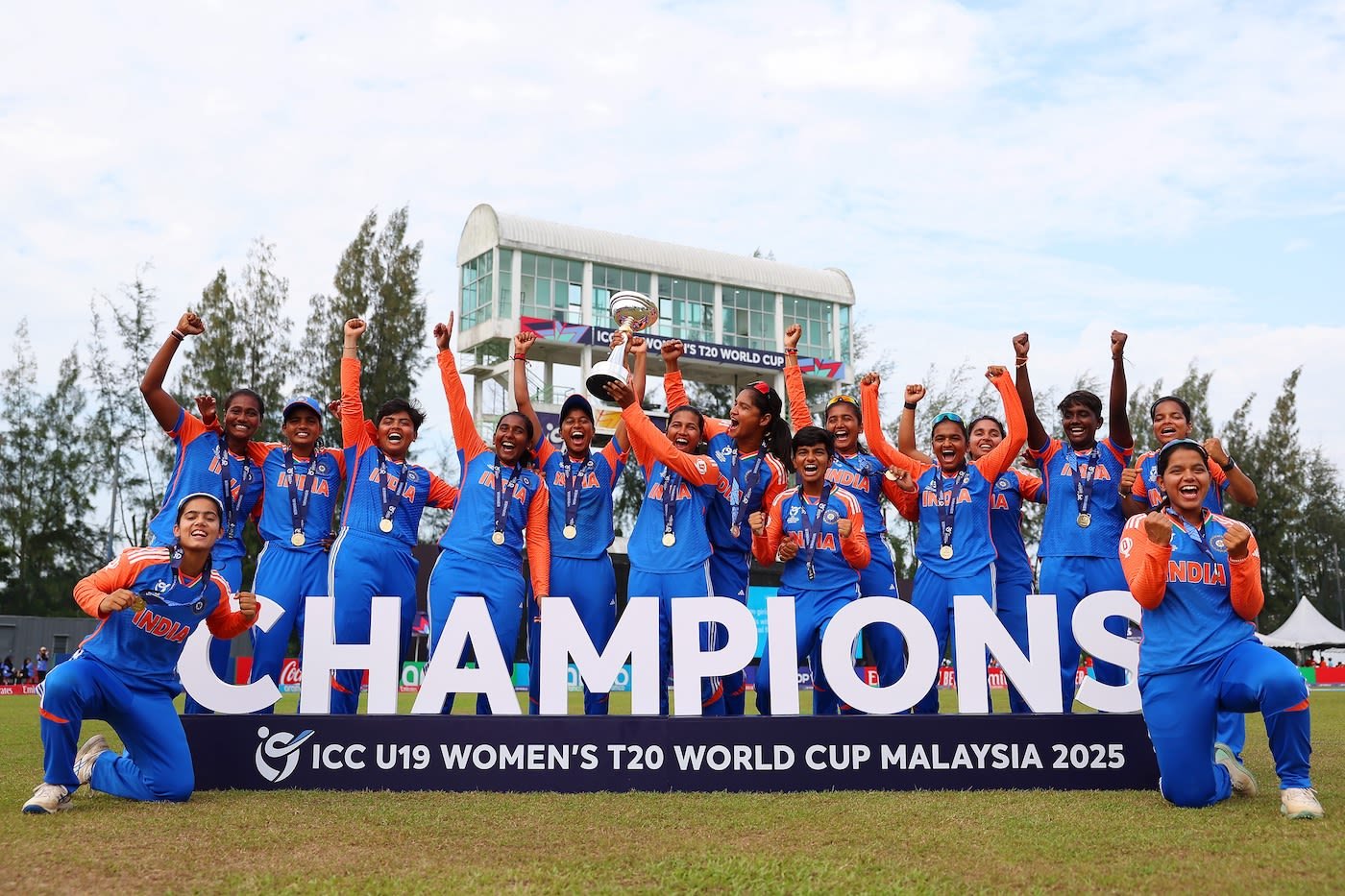 India U19 women's cricket team celebrating with the U19 Women's T20 World Cup trophy